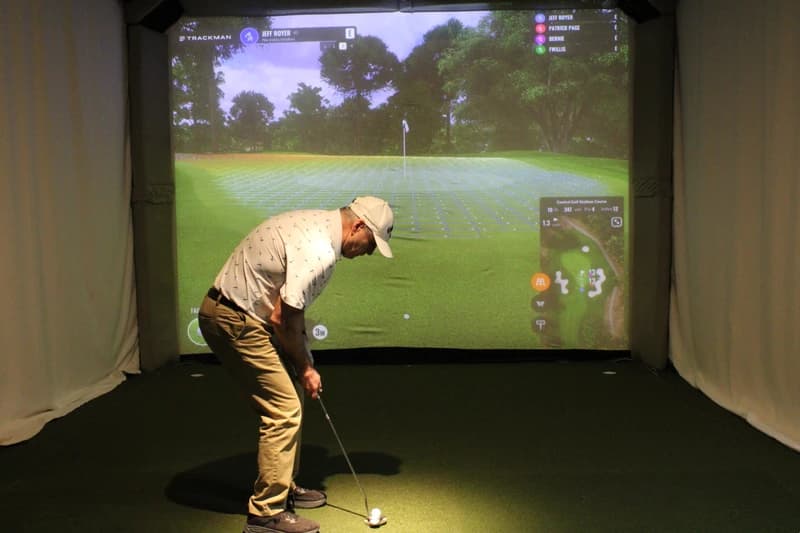 Player practicing putting on TrackMan simulator